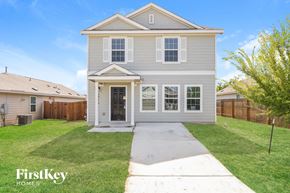 San Antonio house for rent - a white house with a sidewalk in front of it