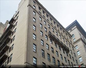 Philadelphia apartment for rent - a tall building with a fire escape on the side of it