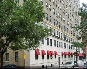 Philadelphia apartment for rent - a large building with a tree in front of it