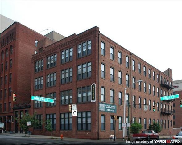 Baltimore apartment for rent - a large brick building on the corner of a street