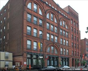 Baltimore apartment for rent - a large brick building on the side of a street