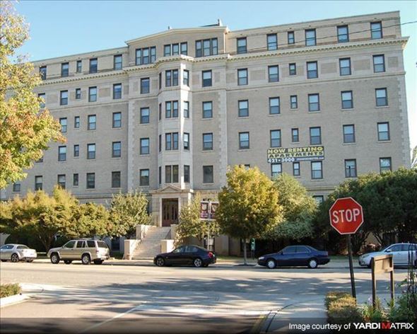Richmond apartment for rent - a large building with a stop sign in front of it