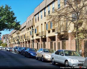 Philadelphia apartment for rent - a row of cars parked on the side of a street