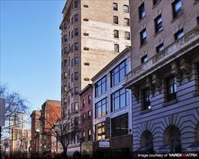 Philadelphia apartment for rent - a group of tall buildings on a city street