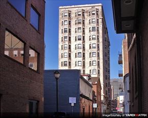 Philadelphia apartment for rent - a tall building in the middle of a city street