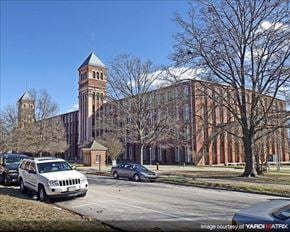 Columbia apartment for rent - a large building with a clock tower on the side of a street