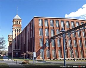 Columbia apartment for rent - a large brick building with a clock tower