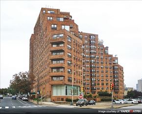 Philadelphia apartment for rent - a tall brick building on the corner of a city street