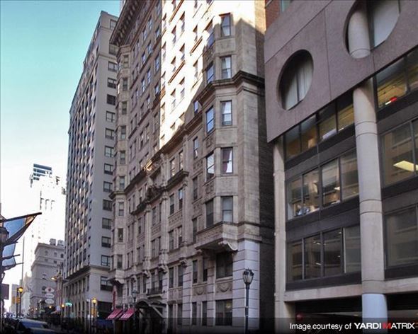 Philadelphia apartment for rent - a tall building on the corner of a city street