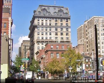 Philadelphia apartment for rent - a tall building on the corner of a city street