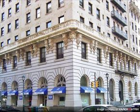 Philadelphia apartment for rent - a large white building with a traffic light in front of it