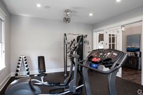 Millbury apartment for rent - a home gym with a treadmill and exercise equipment