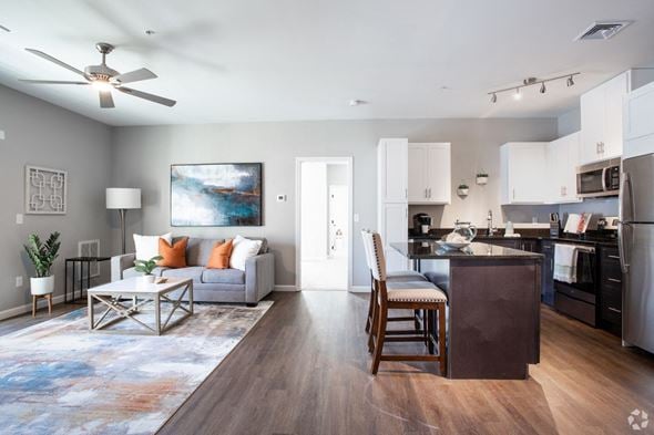 Millbury apartment for rent - a living room with a couch and a kitchen
