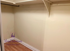 Slater-Marietta house for rent - A room with a wooden floor and white walls.