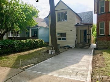 Windsor apartment for rent - a white house with a sidewalk in front of it