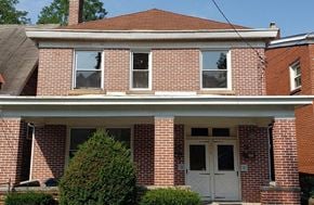 Pittsburgh apartment for rent - a brick house with two white doors