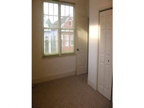 New Orleans apartment for rent - an empty room with a window and a door