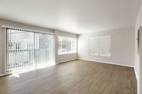 San Francisco apartment for rent - A room with wooden floors and white walls.
