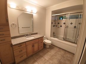 Belcarra apartment for rent - A bathroom with a sink, toilet, and shower.