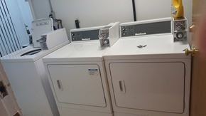 Vancouver apartment for rent - two washers and two dryers in a laundry room