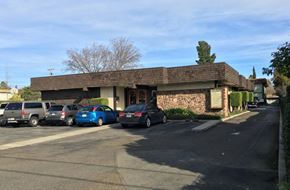 Castro Valley apartment for rent - a building with cars parked in front of it