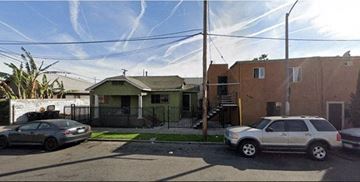 Los Angeles apartment for rent - a street with cars parked in front of a house