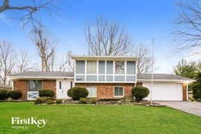 Indianapolis house for rent - a home with a lawn in front of it