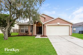 Wesley Chapel house for rent - a house with a driveway and a garage door