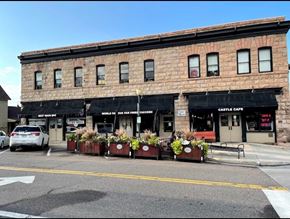 Castle Rock apartment for rent - a brick building on the corner of a city street