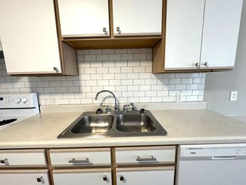 Nashville apartment for rent - A kitchen with a sink and a stove.