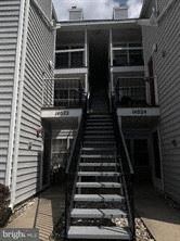 Laurel house for rent - an old building with stairs going up to it
