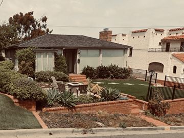 San Diego apartment for rent - a house with a garden in front of it