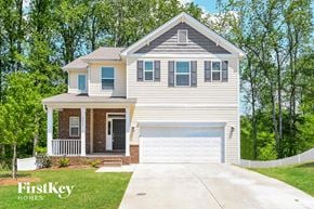 Charlotte house for rent - A two-story house with a garage is for sale by FirstKey Homes.