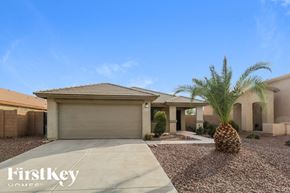 Buckeye house for rent - a house with a palm tree in front of it