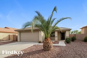Buckeye house for rent - a palm tree in front of a house