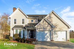 Kernersville house for rent - a home with a white garage door and a white house