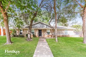 Duncanville house for rent - a small house with trees in front of it