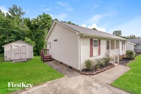 High Point house for rent - A house with a red window is part of a FirstKey Homes property.