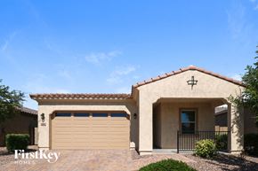 Buckeye house for rent - a house with a garage door in front of it