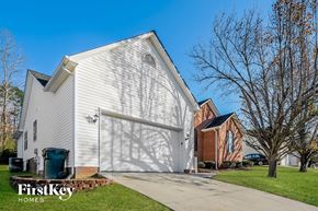 Thomasville house for rent - a white church building with a white garage door