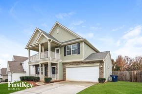 Lexington house for rent - A two-story house with a garage is for sale.