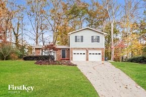 Lawrenceville house for rent - A house with a driveway in front of it.