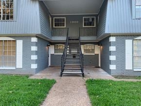 Bay City apartment for rent - a ladder to the side of a building