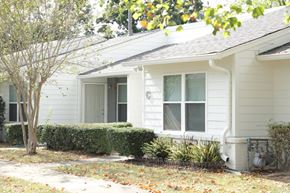 Birmingham apartment for rent - a white house with a sidewalk in front of it