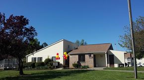 Greensboro apartment for rent - a house with balloons in front of it