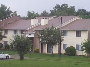 Greensboro apartment for rent - an apartment building with a car parked outside of it
