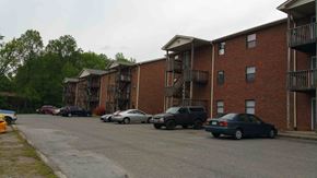 Kernersville apartment for rent - an empty parking lot in front of an apartment building
