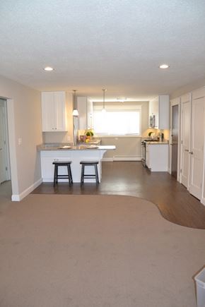 St. Louis Park apartment for rent - a kitchen with an island and a table in it