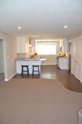St. Louis Park apartment for rent - a kitchen with an island and a table in it