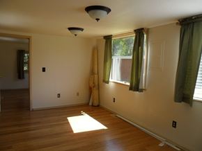 Kenai apartment for rent - A room with a window and a light on the ceiling.